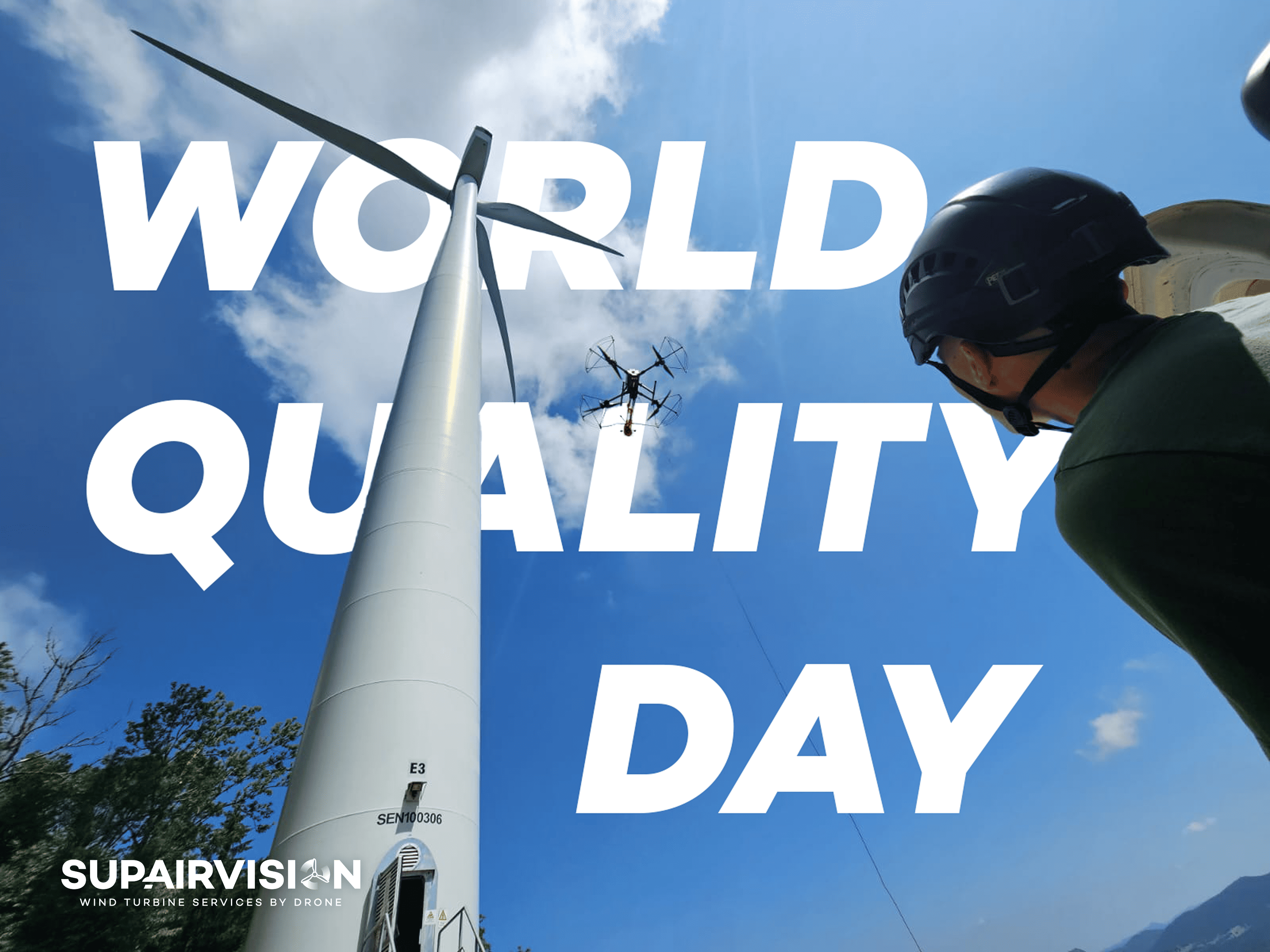Our technician looking into the sky in which it's written "World Quality Day"